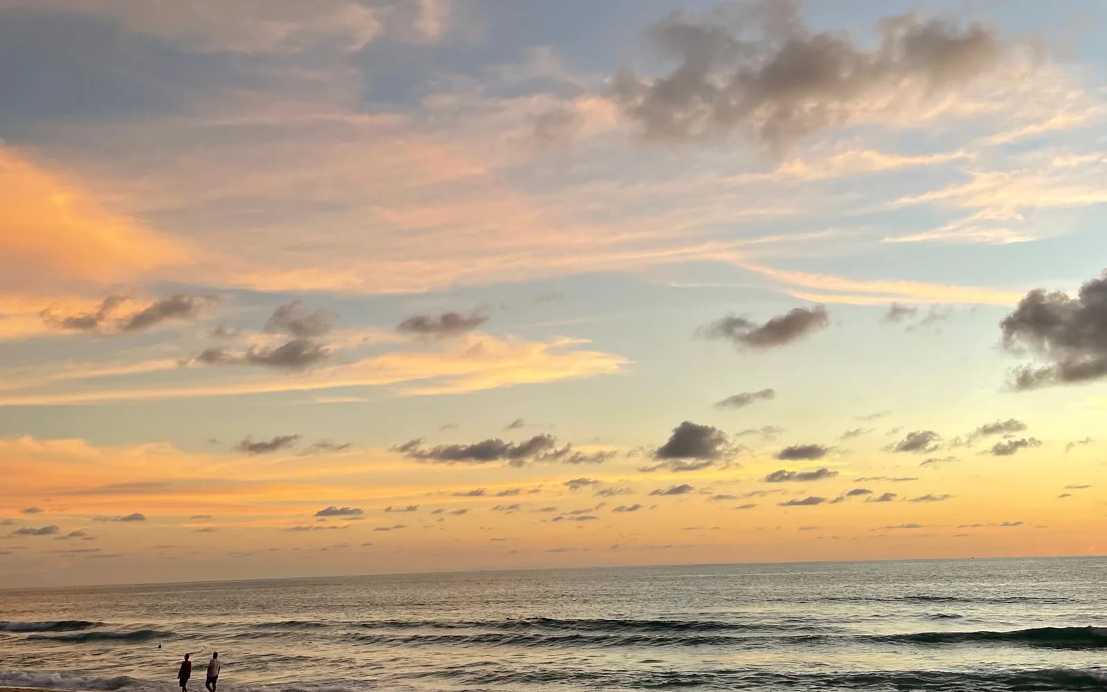 Sunset at Karon Beach, Phuket, with cloud over the shoreline
