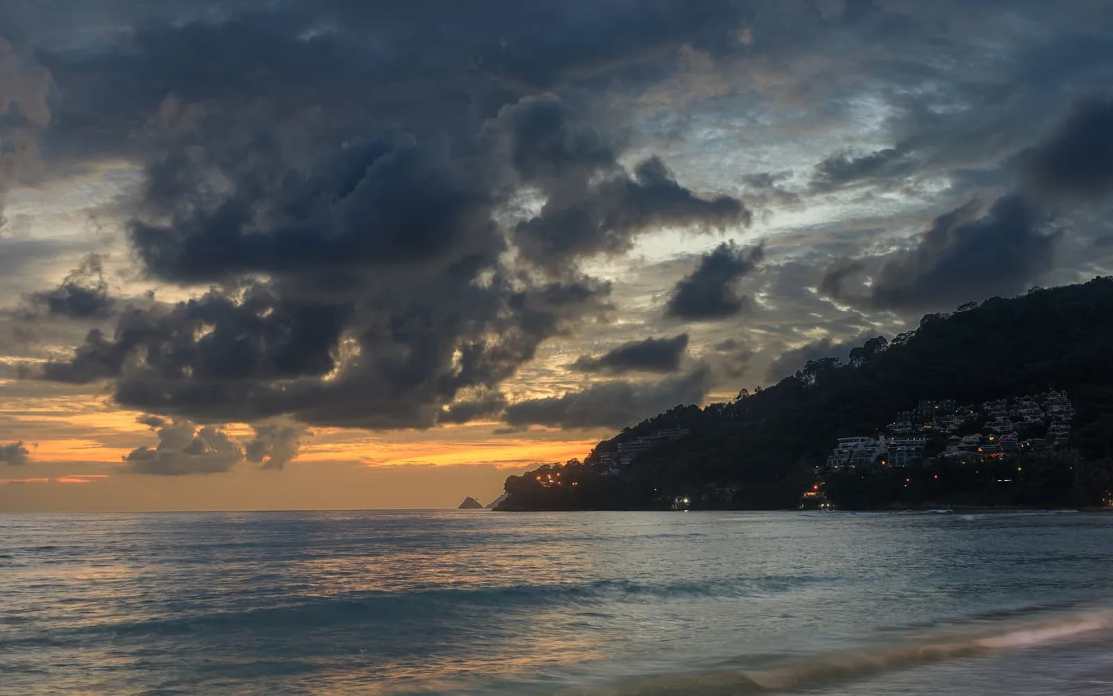Sunset over Patong Beach, Phuket, with dramatic cloud