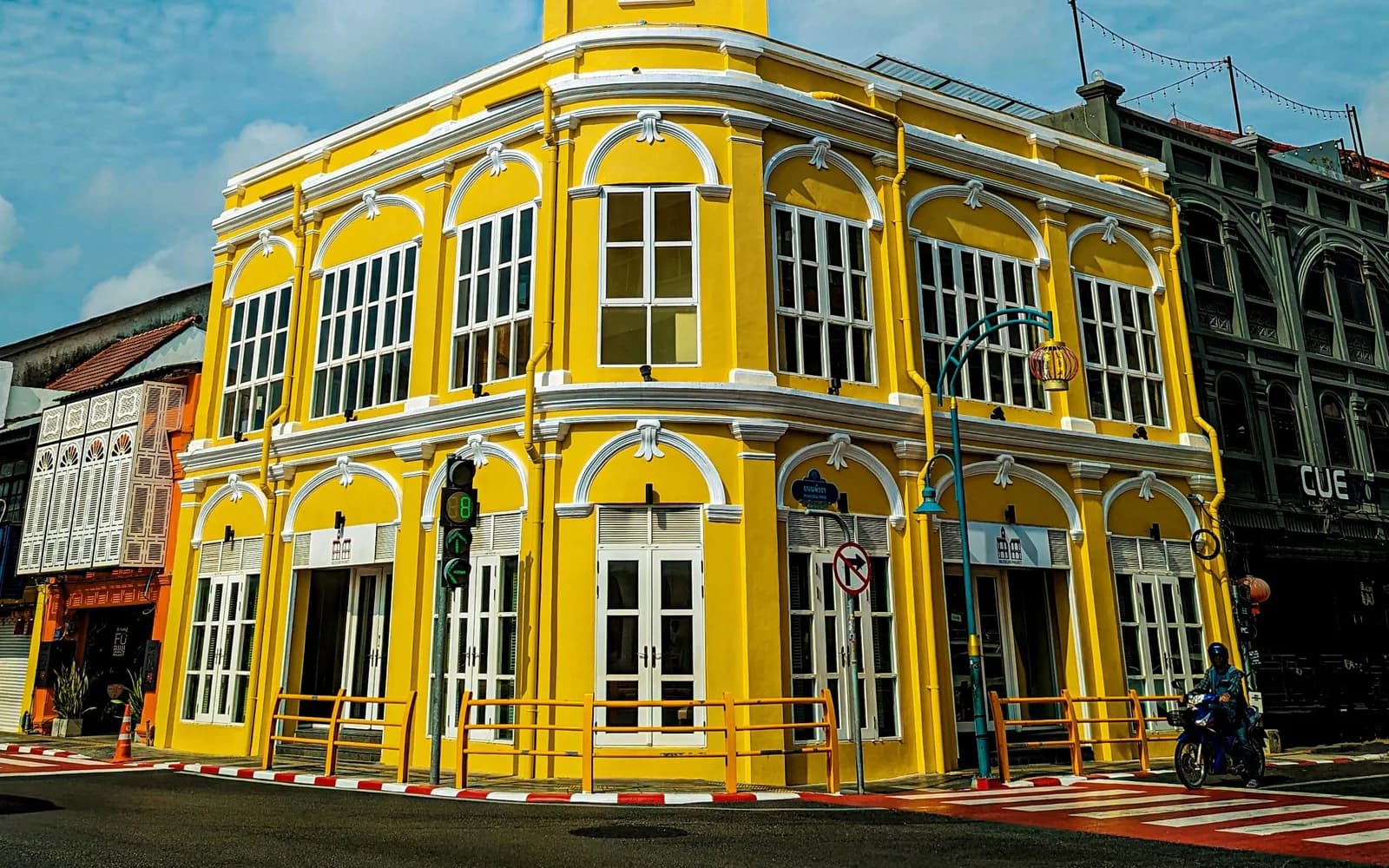 The yellow colonial clock tower building in Phuket Old Town