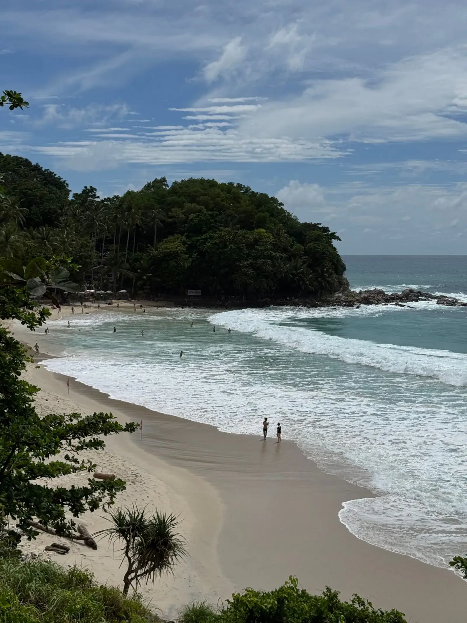 Empty stretch of sand on a calm Phuket bay
