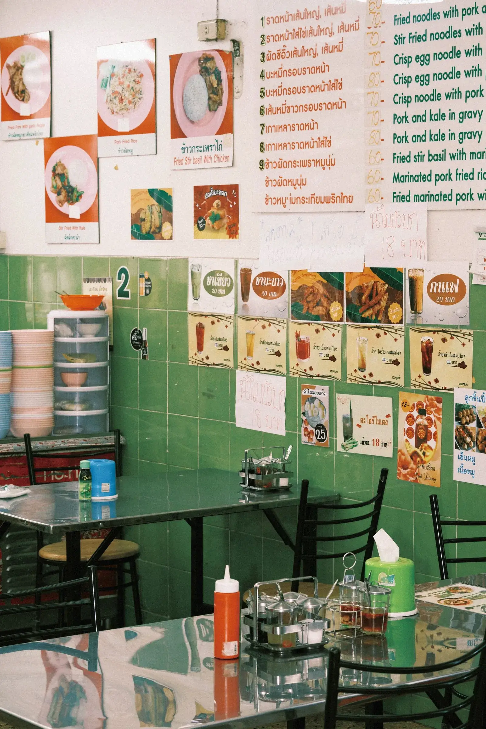 Simple restaurant dining room with green walls